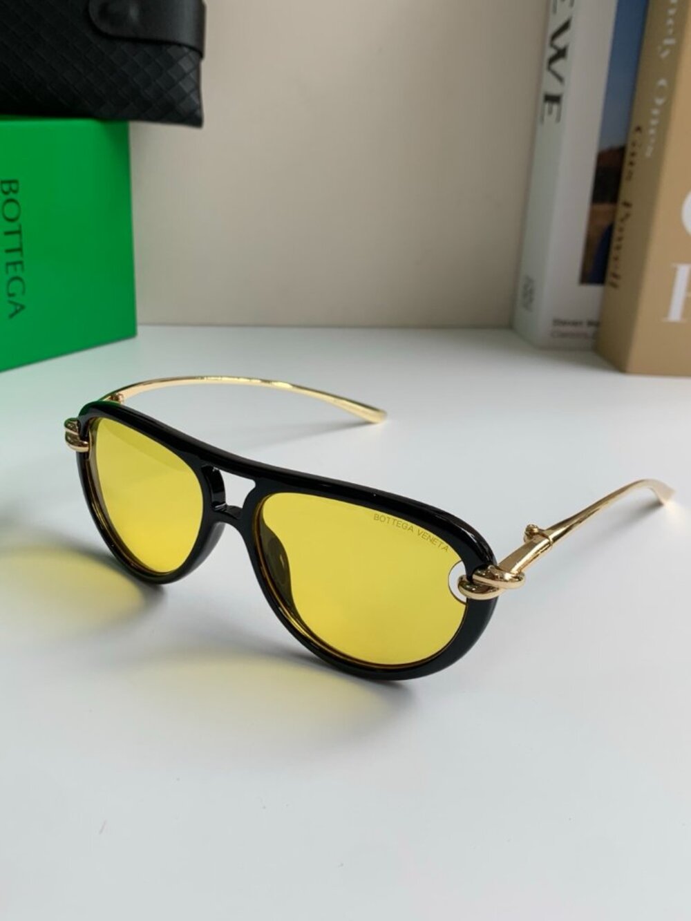 Bottega Veneta Black Frame Sunglasses with Yellow Lenses and Gold Temples